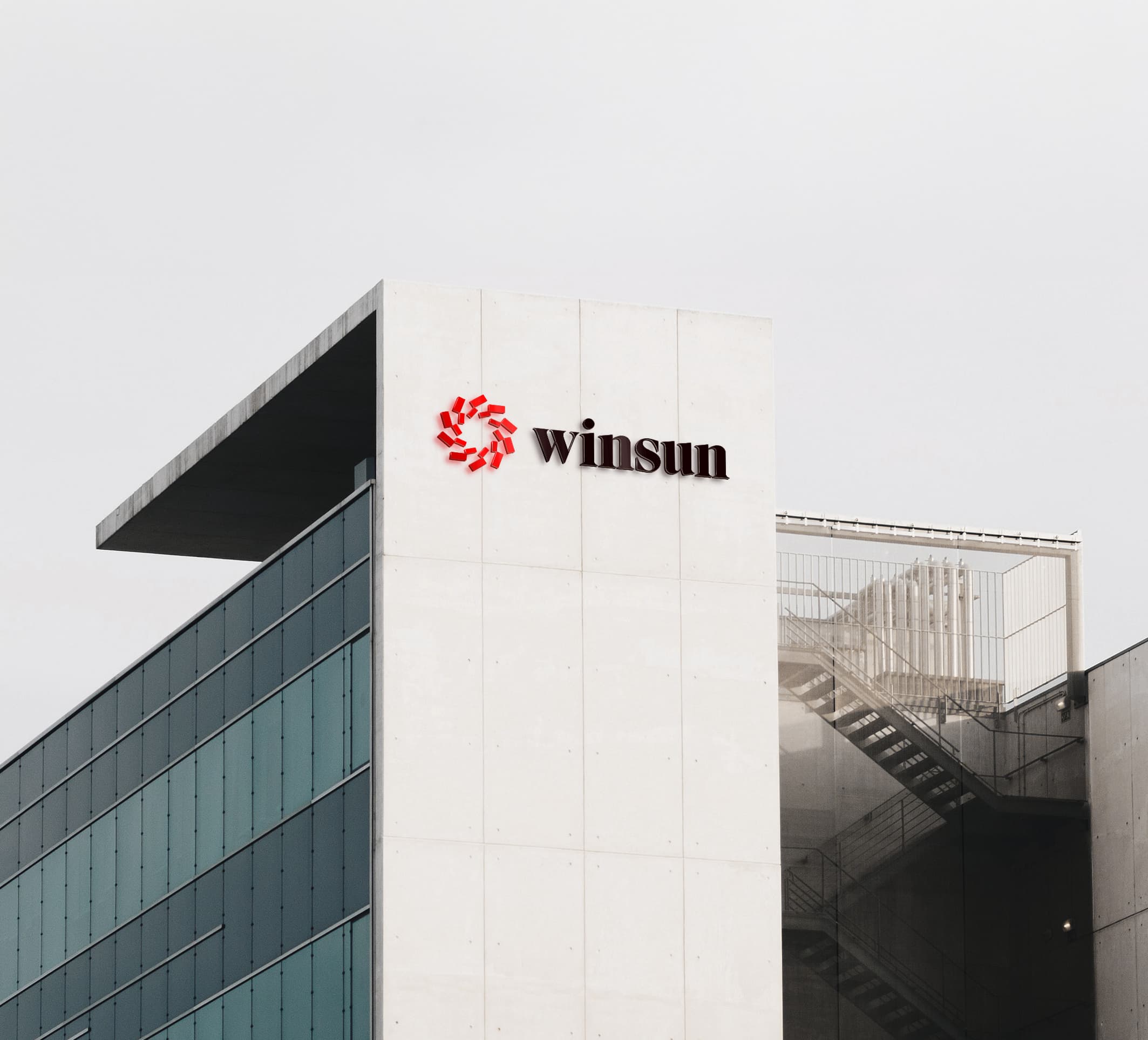 WINSUN logo on a corporate office building facade