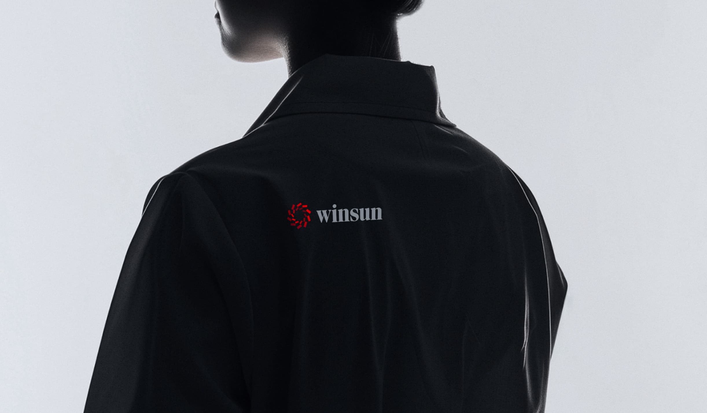 WINSUN logo on a dark jacket