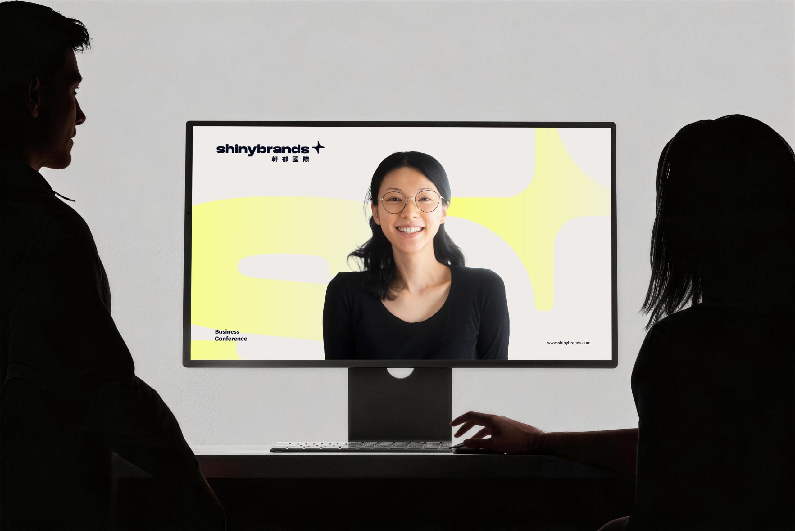 Shinybrands logo on a video call screen in a meeting room